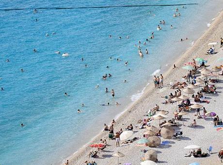 Muğla’da Eylül sıcağı! Sahilde yazı aratmayan görüntüler